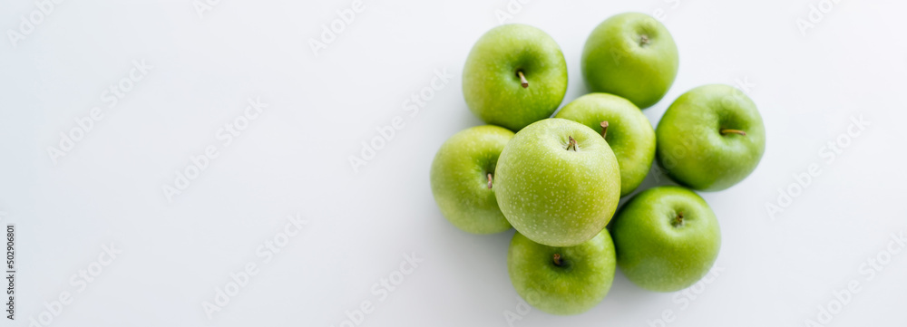 custom made wallpaper toronto digitaltop view of green and ripe apples on white, banner.