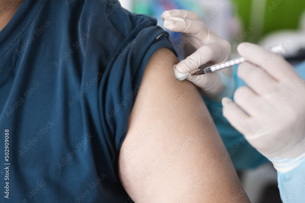 Φωτογραφία Closeup people are being vaccinated with needle from medical staff or nurse or doctor