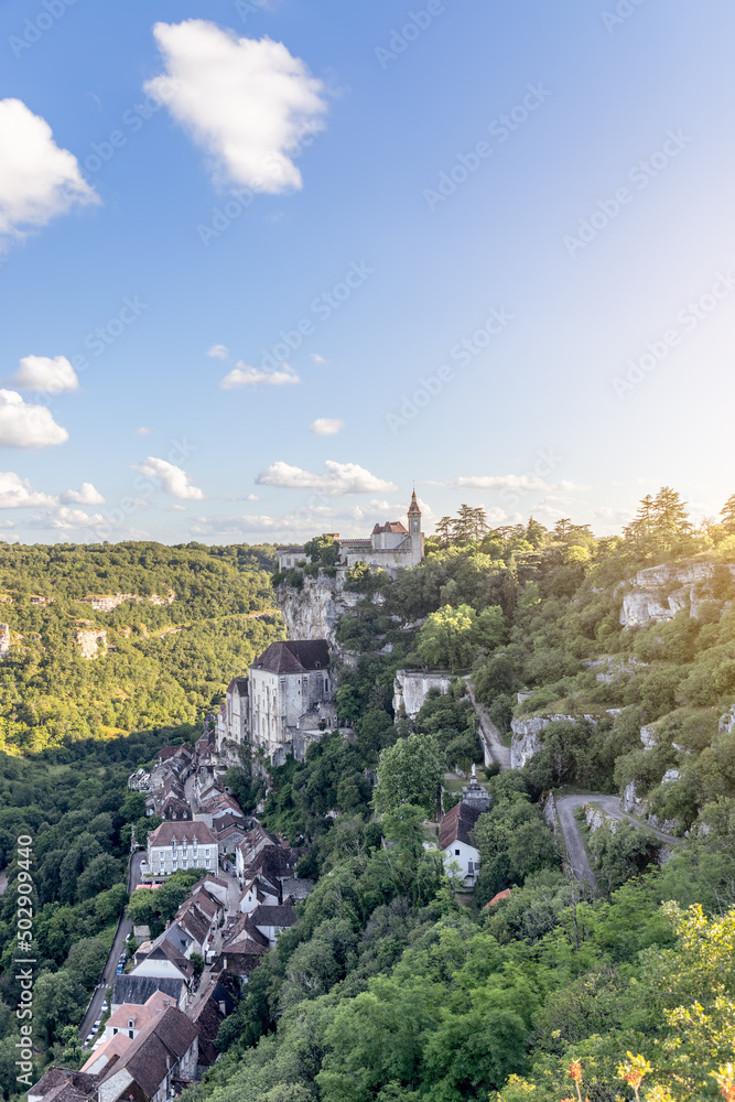View of the famous Rocamadour castle on top of the cliff in Lot, Occitania, Southwestern France (vertical photo)