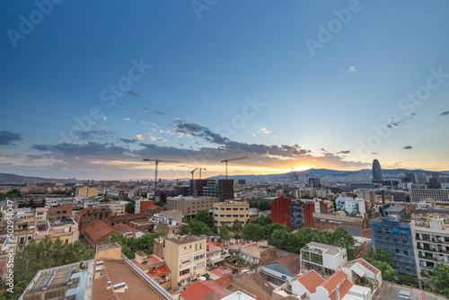 Photography Barcelona skyline with passing clouds