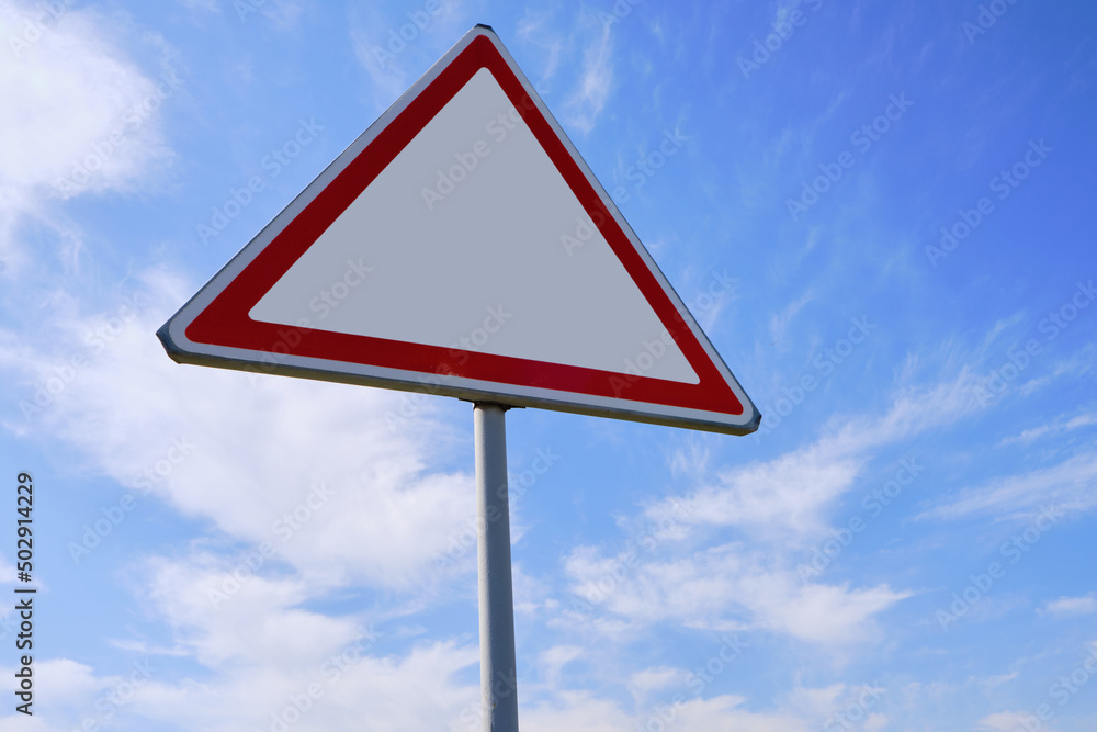Traffic warning sign background clouds and blue sky. Traffic warning sign background clouds and blue sky.