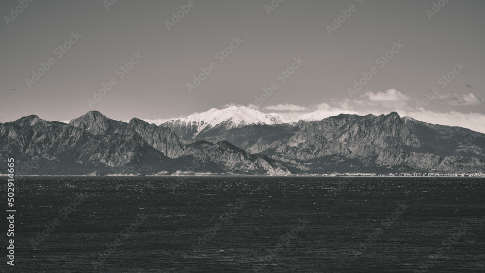 dramatic mountains, sky and sea scenery