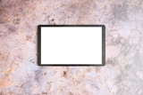 Mockup of a tablet computer on a white screen, copy space