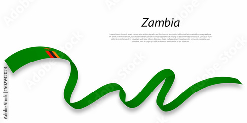 Waving ribbon or banner with flag of Zambia. photo