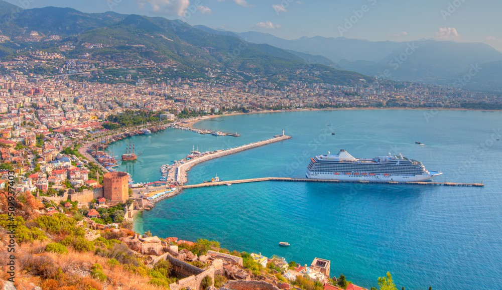 White giant luxury cruise ship on stay at Alanya harbor - Antalya, Turkey