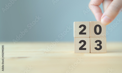 2023 Happy new year. Starting to new year. 2023 written on wooden cubes with smart background. Goals,plan,opportunity and new business or life for the next year. Preparation for the new year change.