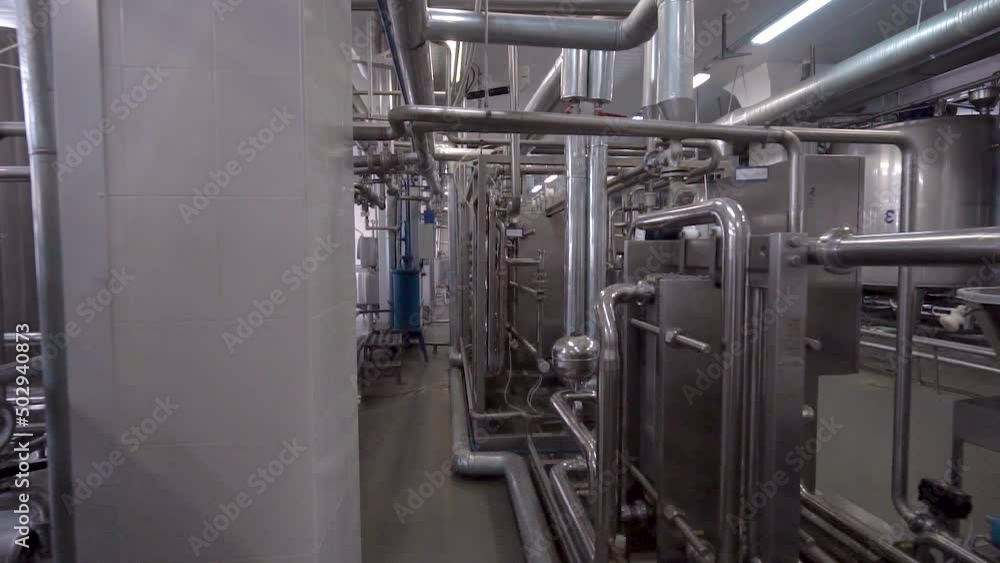 Modern equipment in a food factory. Automatic conveyor, line for the production of ice cream cones. Modern equipment in a food factory. Automatic conveyor, line for the production of ice cream cones.