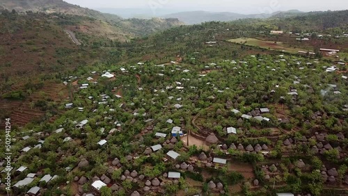 Konso town, cultural landscape in Omo Valley, Ethiopia. Wonderful aerial view of African fortified settlement on hill summit. photo