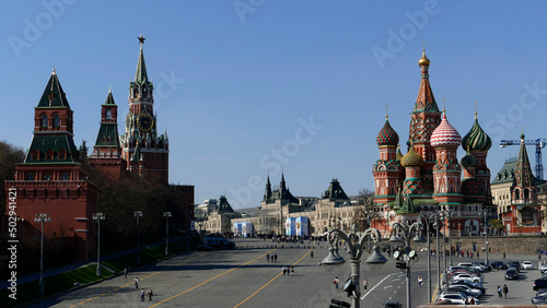 Red Square with St Basil's Cathedral, Spasskaya Tower of Kremlin and lots of tourists before Victory Day 