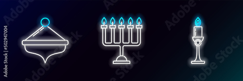 Set line Burning candle in candlestick, Hanukkah dreidel and menorah icon. Glowing neon. Vector