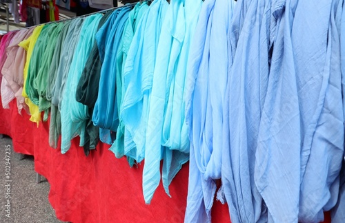 Tableau sur toile many shirts of many color for sale at market