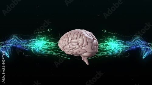 Human brain spinning against green and blue digital waves on black background