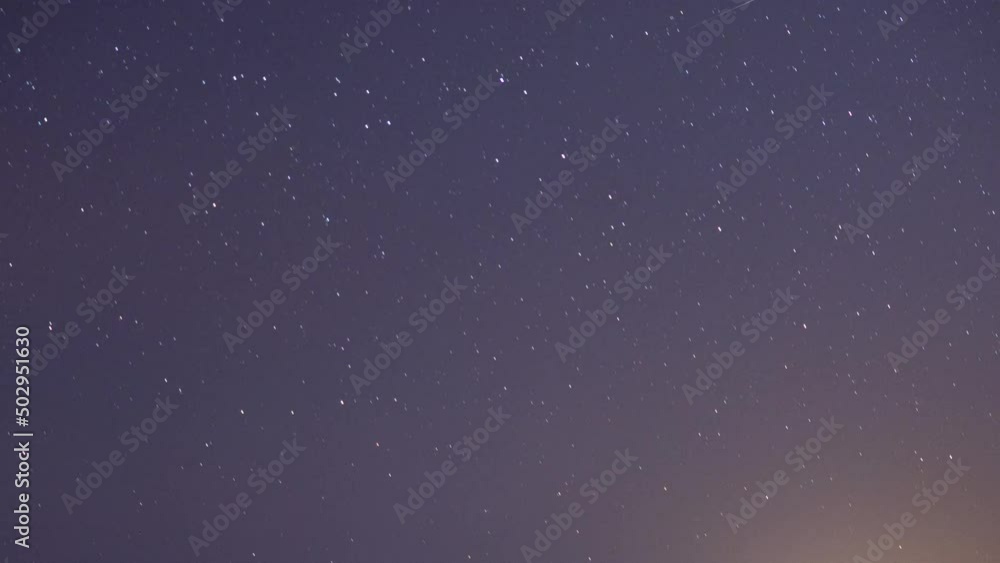 Star passing in a night sky Star passing in a night sky
