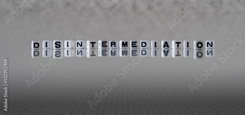 disintermediation word or concept represented by black and white letter cubes on a grey horizon background stretching to infinity