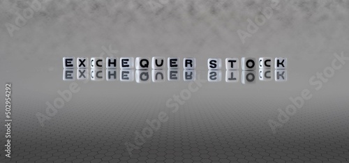 exchequer stock word or concept represented by black and white letter cubes on a grey horizon background stretching to infinity