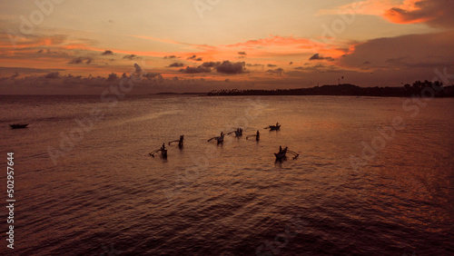 Ocean fishing boats, top view, drone shot. © insomniafoto