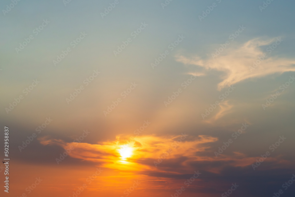 Beautiful sunset. Orange sky with gray clouds. Sunset Sky with clouds Background