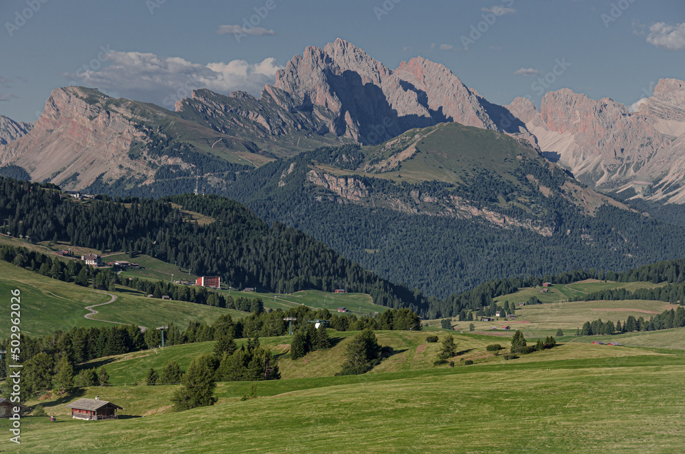 North-east view of Puez-Odle Nature park with Seceda, Fermeda di Sotto & Sass Rigas mountains, as seen from Seiser Alm/Alpe di Siusi plateau, Dolomites, Trentino, Alto Adige, South Tyrol, Italy