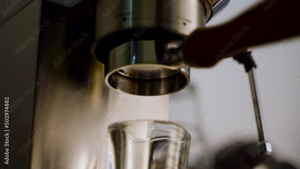Close up of a failed pulling an espresso shot due to coffee ground is too fine grind Close up of a failed pulling an espresso shot due to coffee ground is too fine grind
