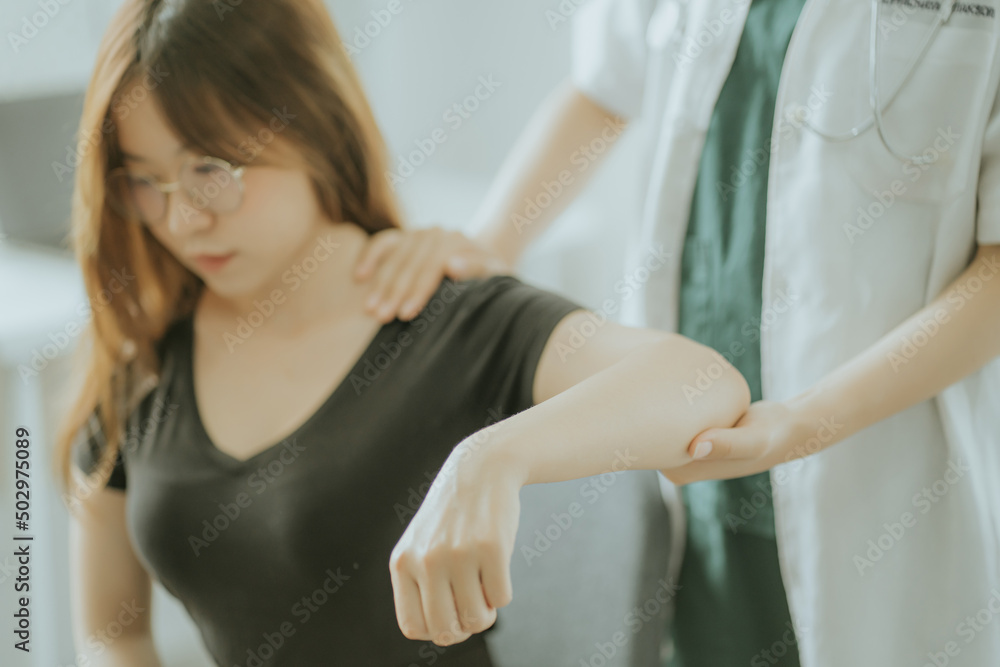 Physiotherapist is doing physical therapy for a patient, the patient has body aches due to overwork and has undergone treatment and physiotherapy with a professional physiotherapist. Physiotherapist is doing physical therapy for a patient, the patient has body aches due to overwork and has undergone treatment and physiotherapy with a professional physiotherapist.