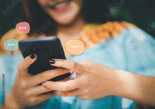 Chat messages smartphone, Sms on mobile phone screen or conversation sending messages concept. Casual Women chatting, Messaging using or Online live chat, chat app or social network. Work from home.