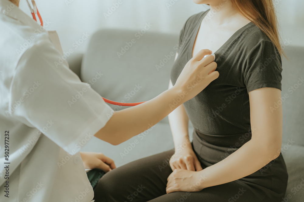 Obraz premium Physiotherapist is doing physical therapy for a patient, the patient has body aches due to overwork and has undergone treatment and physiotherapy with a professional physiotherapist.