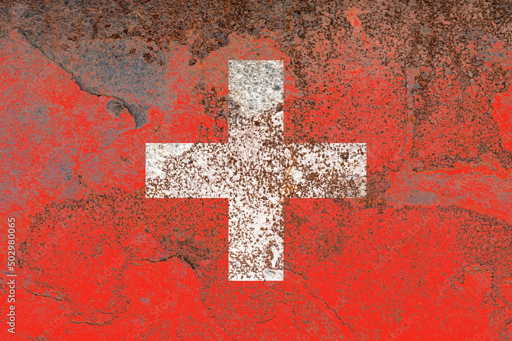 National flag of switzerland painted on a distressed old rusty iron sheet National flag of switzerland painted on a distressed old rusty iron sheet