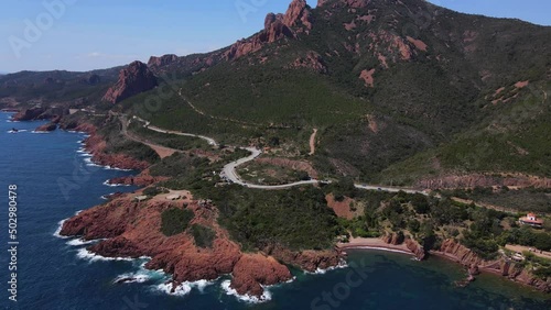 Aerial flyover of the Massif de L'Esterel and the epic highway coastline between St Tropez and Cannes photo