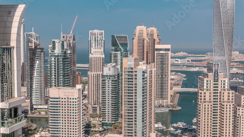 Canal in Dubai Marina with luxury skyscrapers around timelapse, United Arab Emirates © neiezhmakov
