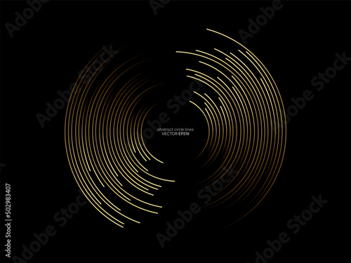 Abstract circle line pattern spin gold light isolated on black background in the concept of music, technology, digital