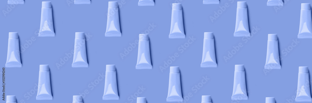 Blank tube layout on blue background. Cosmetic product. Skin care. Female hygiene. Banner. Pattern. Blank tube layout on blue background. Cosmetic product. Skin care. Female hygiene. Banner. Pattern.