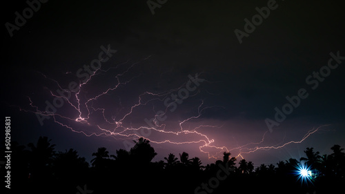 lightning, Thunderbolt, thunderstorm in the night sky in the Indian village