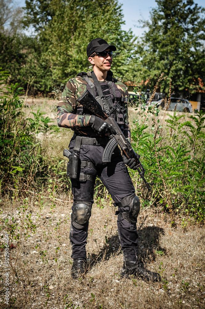 Full armed swat special forces army soldier in combat uniform Full armed swat special forces army soldier in combat uniform