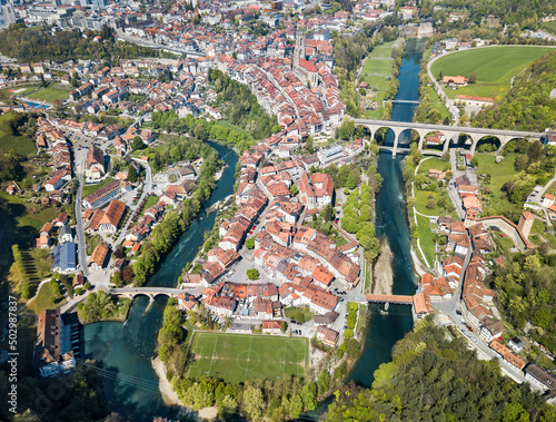 Aerial view of the old town Fribourg and the curvy Sarine river meander, Switzerland.