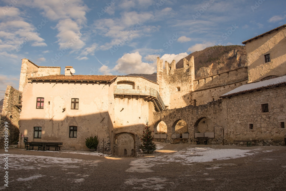 The Piazza Grande courtyard in the medieval 12th century Beseno Castle in Lagarina Valley in Trentino, north east Italy. The Powder Magazine is central right. The biggest castle in the region
