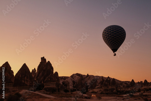 hot air ballon silhouette at sunrise in Goreme, Turkey