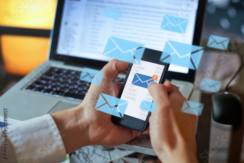 Tableau sur toile send email or receive e-mail concept, smartphone in hands