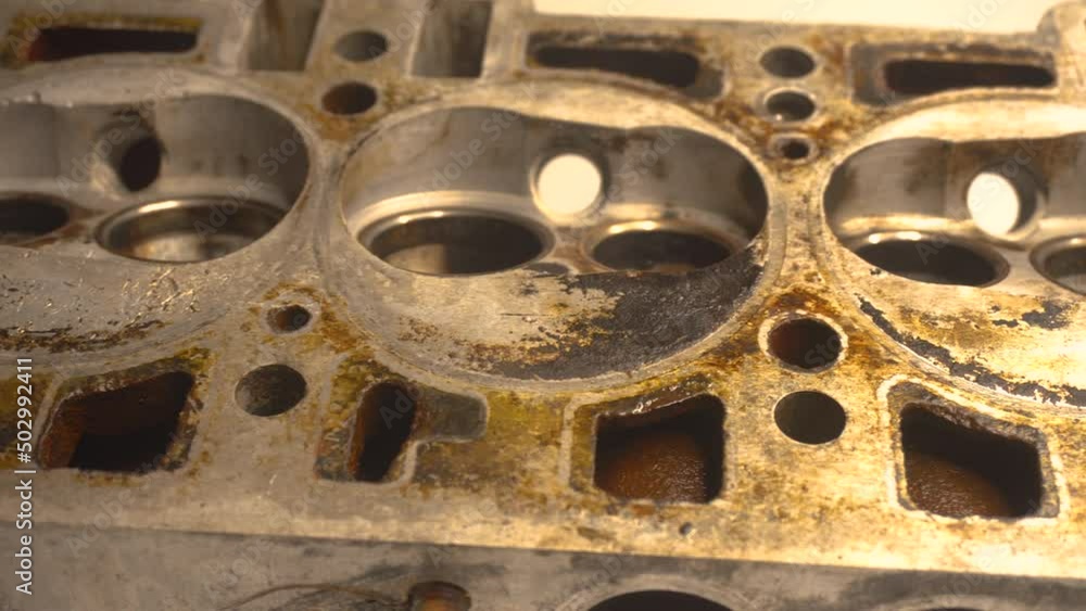 Defective Cylinder Head of Diesel Engine Car in Repair Shop Defective Cylinder Head of Diesel Engine Car in Repair Shop
