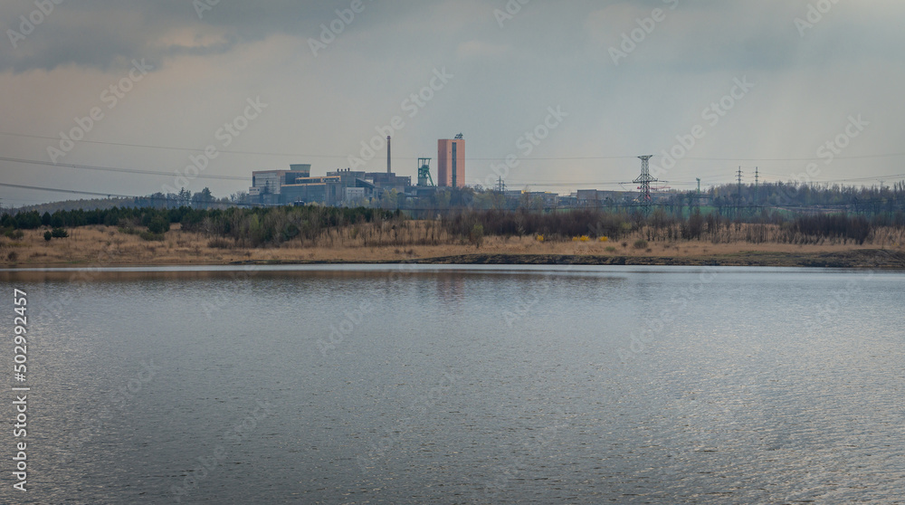 Lake in Karvina city known locally as Karvinske more with a view on mining tower, the lake was created when the mined ground fell below the level of the groundwater