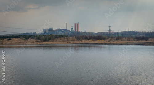 Lake in Karvina city known locally as Karvinske more with a view on mining tower, the lake was created when the mined ground fell below the level of the groundwater