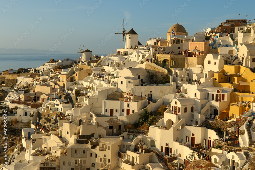 The whitewashed hillside buildings of the village Oia, Santorini, Greece