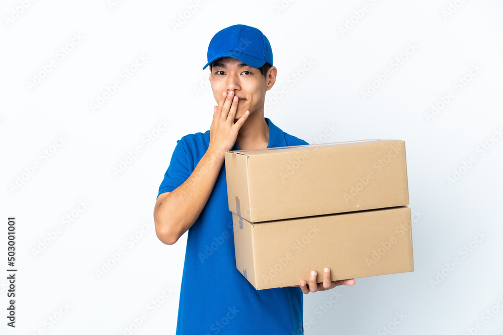Delivery Chinese man isolated on white background happy and smiling covering mouth with hands Delivery Chinese man isolated on white background happy and smiling covering mouth with hands