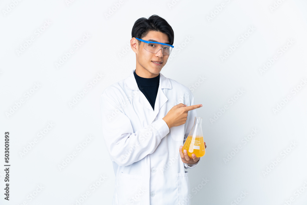 Young Chinese scientific man isolated on white background pointing finger to the side Young Chinese scientific man isolated on white background pointing finger to the side
