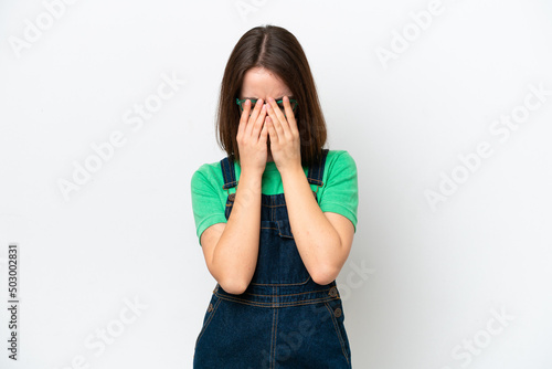 Young Ukrainian woman isolated on white background with tired and sick expression