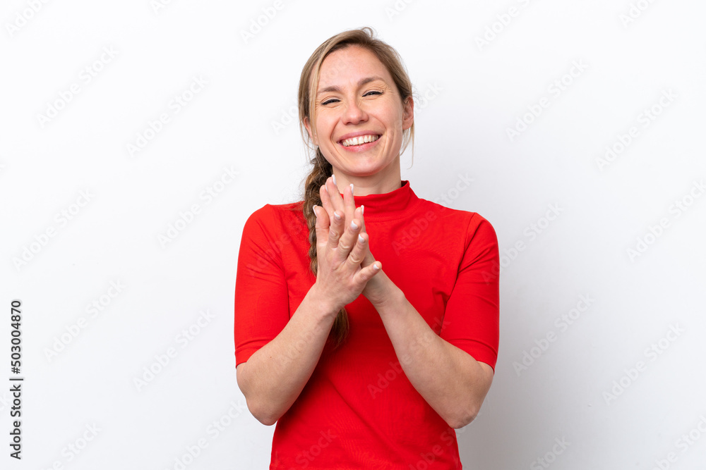 Young caucasian woman isolated on white background applauding after presentation in a conference Young caucasian woman isolated on white background applauding after presentation in a conference