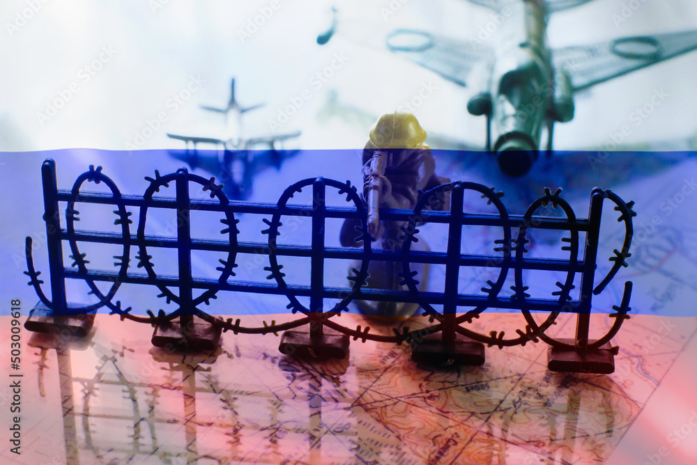 Military toy plane on the background of the map of Ukraine. Concept Military toy plane on the background of the map of Ukraine. Concept