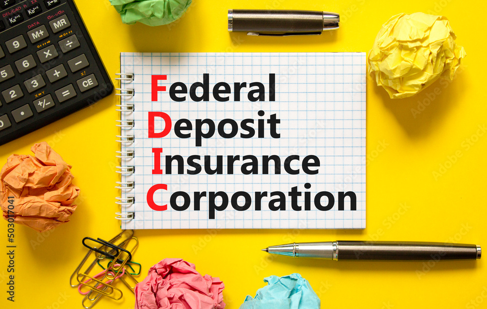 FDIC federal deposit insurance corporation symbol. Concept words FDIC federal deposit insurance corporation on yellow background. Business FDIC federal deposit insurance corporation concept. FDIC federal deposit insurance corporation symbol. Concept words FDIC federal deposit insurance corporation on yellow background. Business FDIC federal deposit insurance corporation concept.