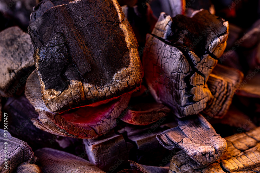 Glowing Hot Charcoal Background Texture. Red hot coals in the grill close up. hot red coals among black ash, wallpapers for mobile devices, abstract. Glowing Hot Charcoal Background Texture. Red hot coals in the grill close up. hot red coals among black ash, wallpapers for mobile devices, abstract.