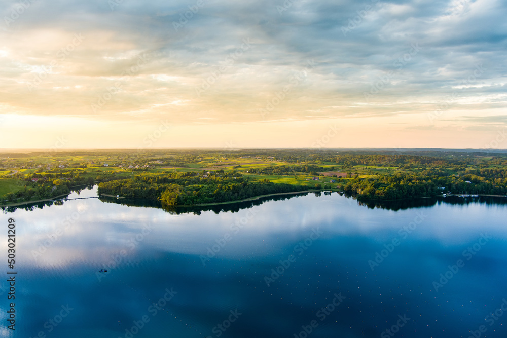 Fototapeta premium Beautiful aerial view of lake Galve, favourite among water-based tourists, divers and holiday makers, located in Trakai, Lithuania.