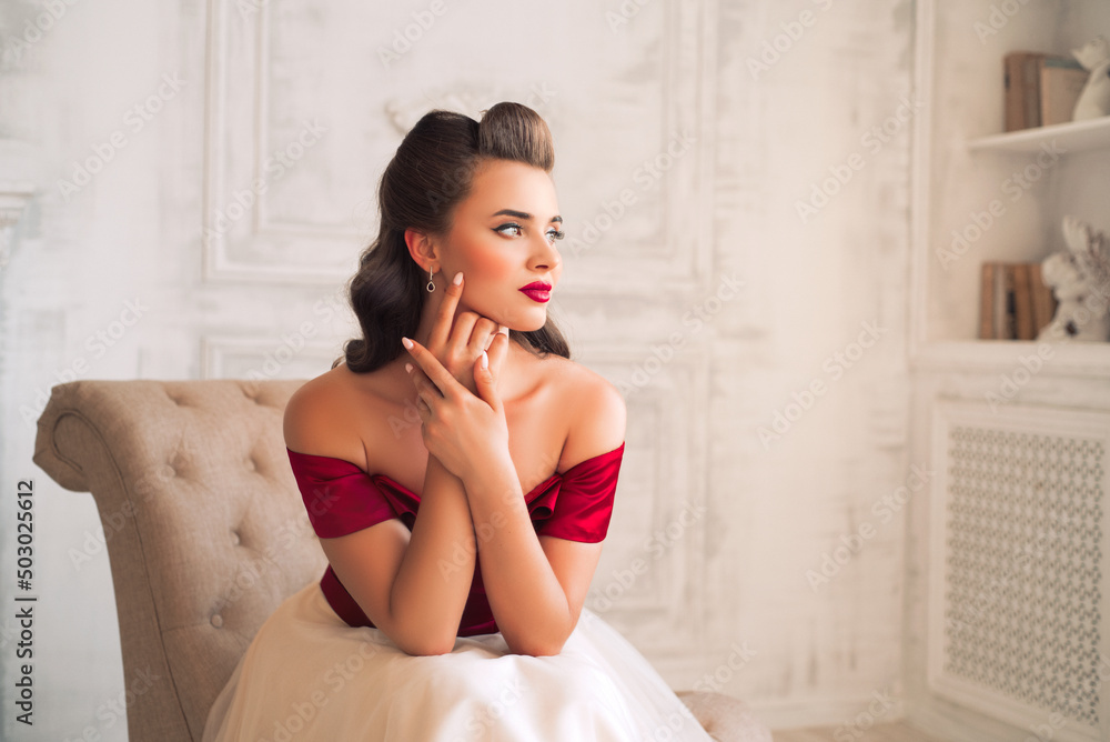 Pretty coquettish pin-up girl in retro interior Pretty coquettish pin-up girl in retro interior